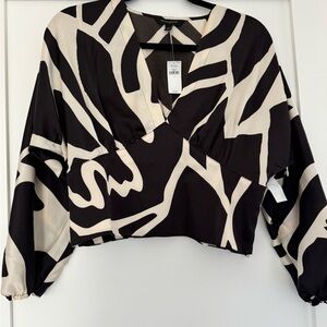 Banana Republic black and cream silky blouse size 8 (runs small).